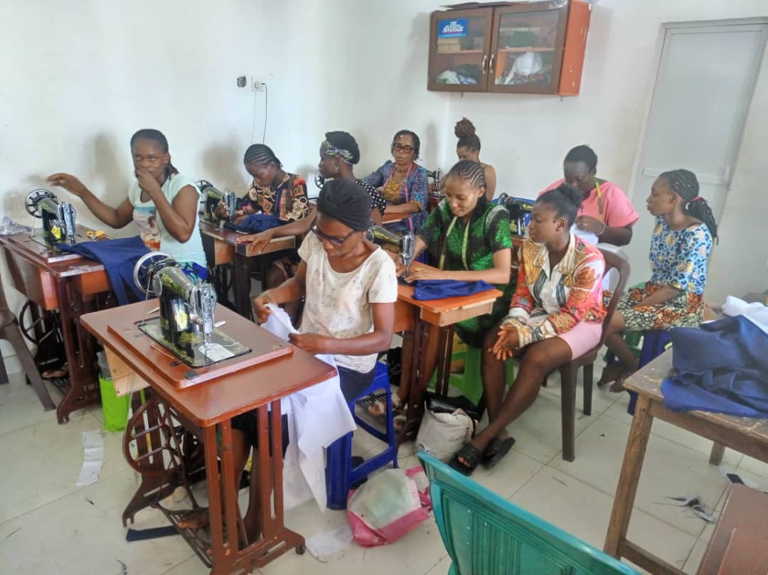 Women learning how to sew in class - Education in Nigeria 
