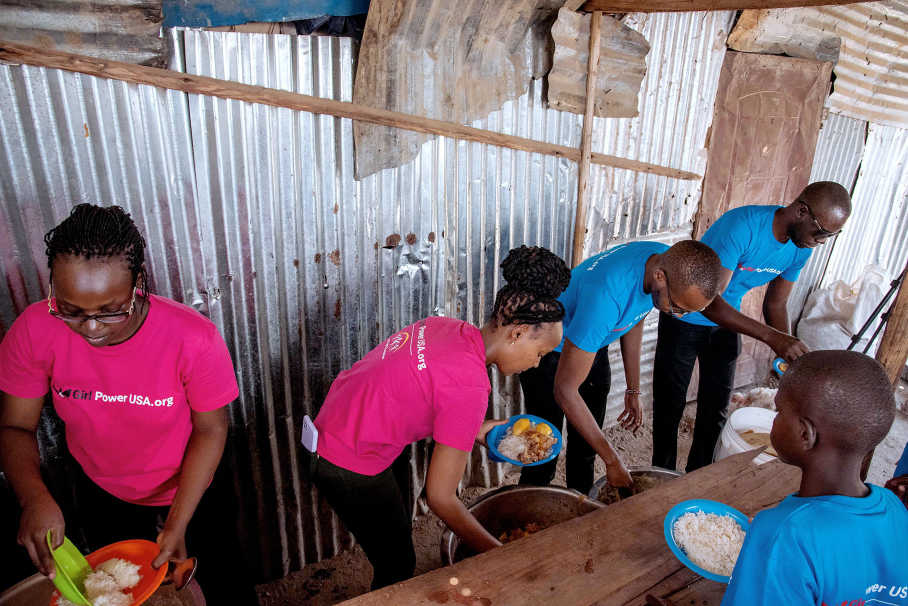 Girl-Power-USA-volunteers-serving-food-to-children