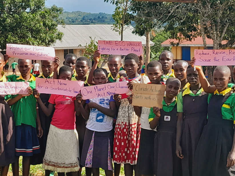 Eco-Warriors-team-holding-climate-change-banners