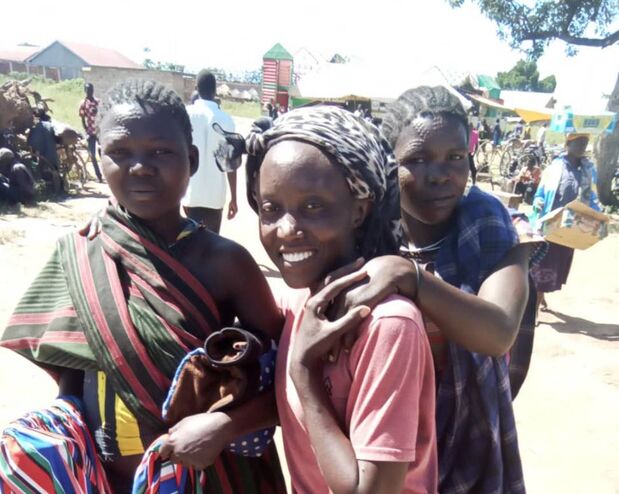 Dr.Agnes-with-children-at-a-medical-camp.